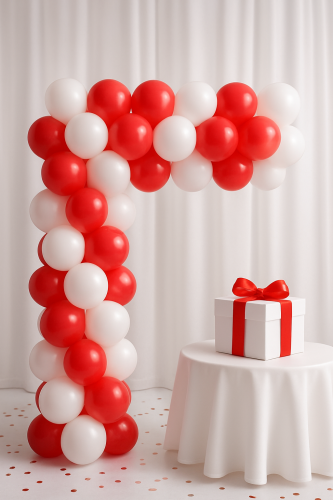 Balonowy łuk z prezentem i konfetti.png